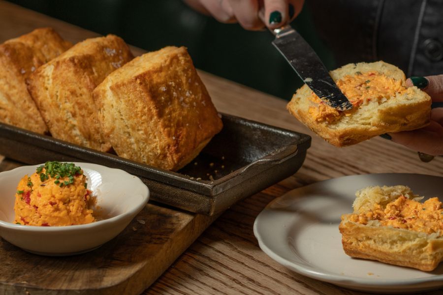 Buttermilk biscuits served with pimento cheese at St. Anselm.