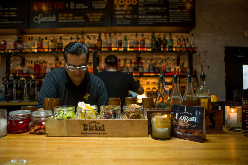 Bartender at Chicken + Whiskey secret bar on 14th Street - Where to find speakeasy bars in Washington, DC